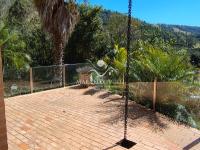 Casa Vista para as montanhas e lago.