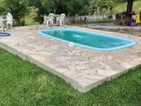 Chácara com  2 tanques de peixes e 4 nascentes de agua captada.